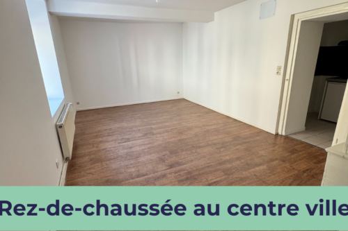 Appartement situé en rez-de-chaussée au centre-ville de Comm