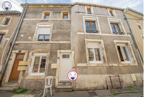 Immeuble de rapport idéalement situé dans la ville de Saint-